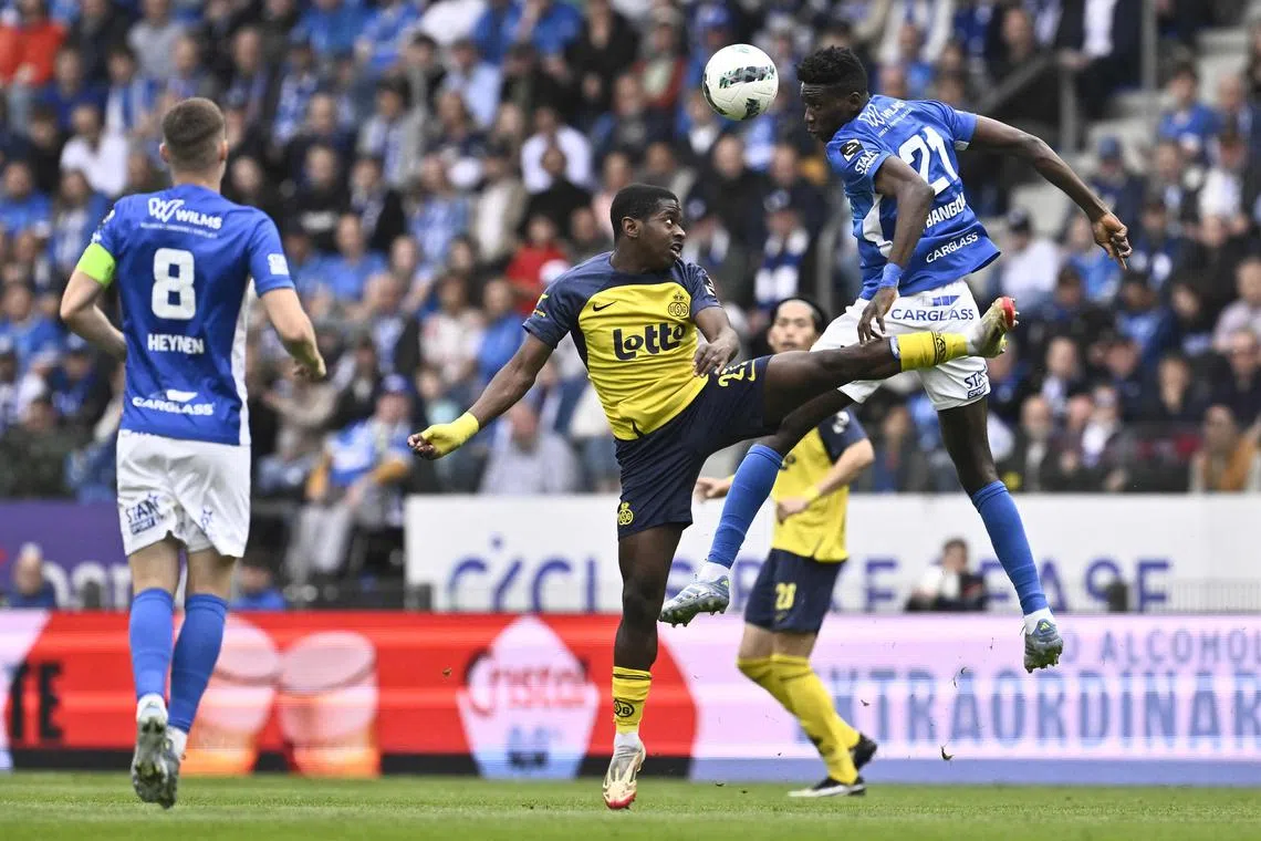 Union Saint Gilloise and Genk players in action during the match on April 20.