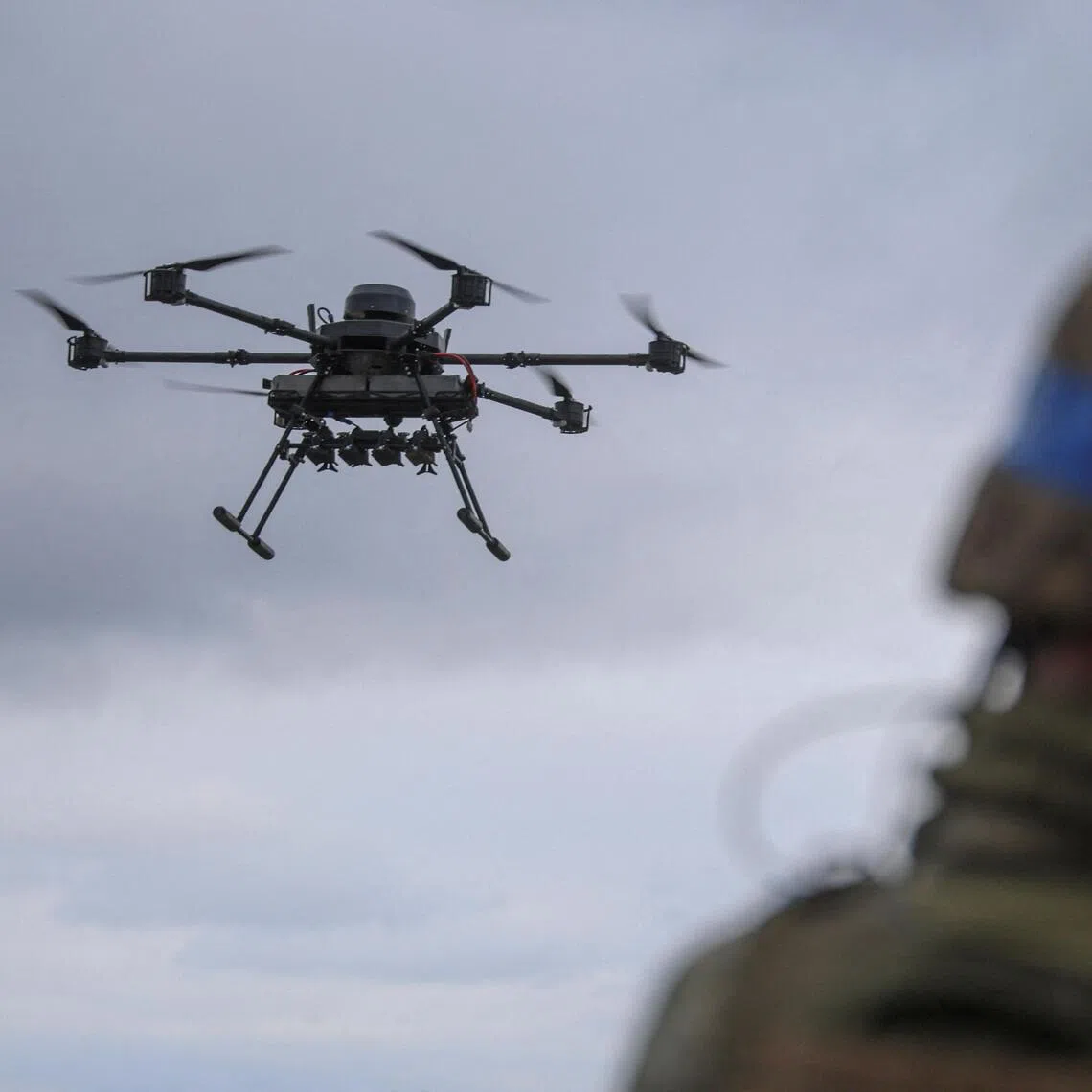 FILE PHOTO: A Ukrainian serviceman of the 25th Airborne Brigade looks at a Vampire, a heavy unmanned aerial vehicle, during its flight near a front line, amid Russia's attack on Ukraine, in Donetsk region, Ukraine April 5, 2025. REUTERS/Oleksandr Ratushniak/File Photo
