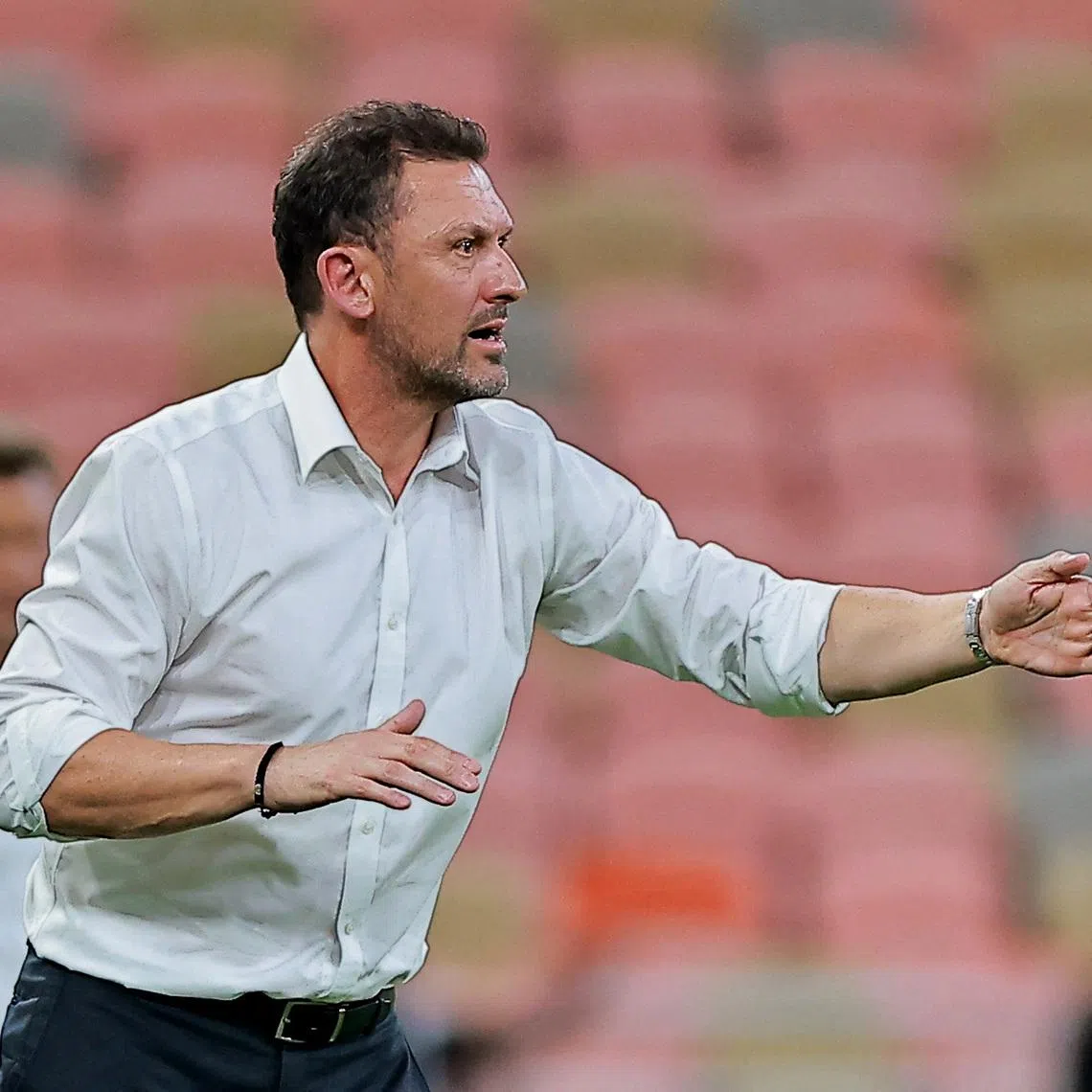 Soccer Football - World Cup - AFC Qualifiers - Group C - Saudi Arabia v Australia - King Abdullah Sports City Stadium, Jeddah, Saudi Arabia - June 10, 2025 Australia coach Tony Popovic reacts REUTERS/Stringer