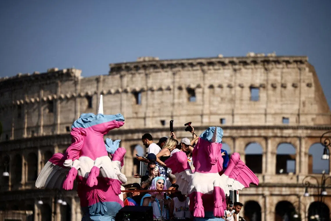 FILE PHOTO: People attend the annual LGBTQ+ Pride parade in Rome, Italy, June 14, 2025. REUTERS/Yara Nardi/File Photo