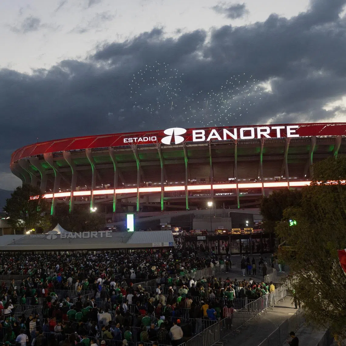 Fans line up outside Azteca Stadium, officially renamed Estadio Banorte, on the day of a friendly match between the national teams of Mexico and Portugal held to mark the stadium's inauguration, as Mexico prepares for the 2026 FIFA World Cup co-hosted by the United States, Canada and Mexico, in Mexico City, Mexico, March 28, 2026. REUTERS/Quetzalli Nicte-Ha