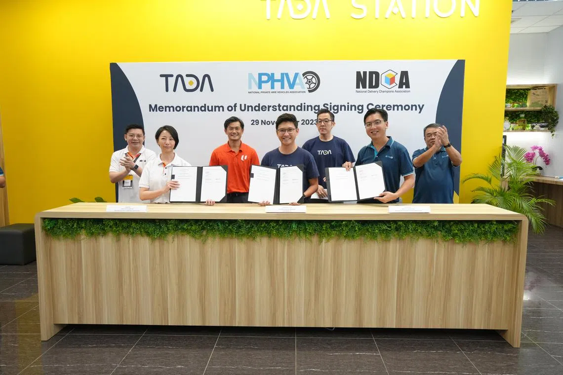 (From left) NDCA general secretary Max Tay, NDCA executive secretary Jean See, NTUC deputy secretary-general Desmond Tan, Tada regional general manager Jonathan Chua, Tada chief executive Sean Kim, NPHVA executive secretary Raven Lee and NPHVA general secretary Joseph Goh at the signing. 