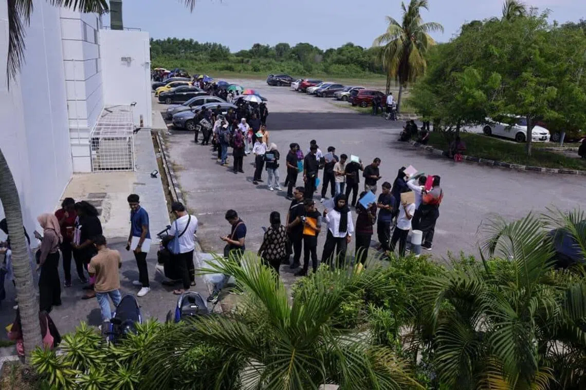 Many had turned up as early as 5am on June 14 to attend an open interview session by Germany’s Infineon Technologies AG, where the company was hiring production operators and technicians.