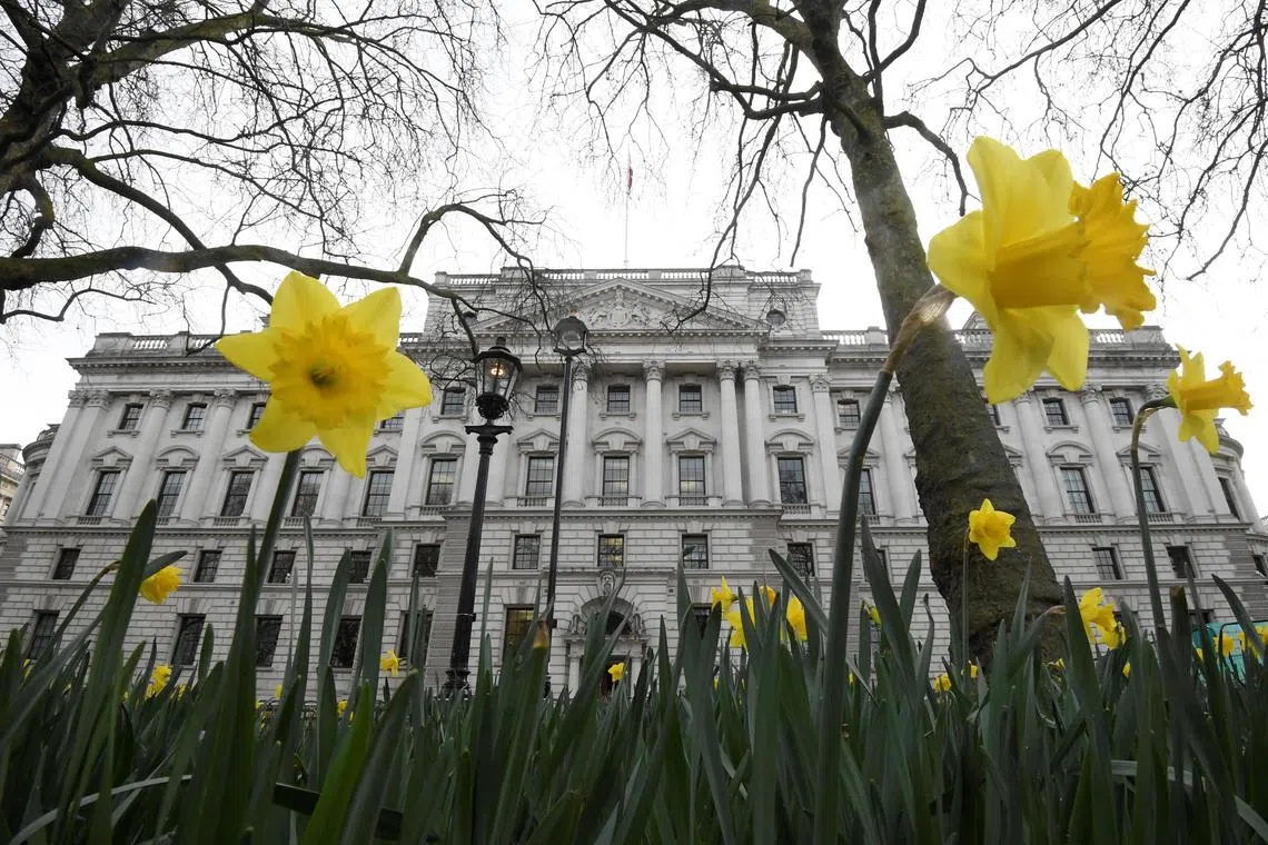 A file photo of the Treasury building in London, Britain. Britain’s tax authority failed to collect S$68 billion in 2021-22, in large part because it did not have the staff to ensure compliance, leaving the public finances under even greater strain, a committee of lawmakers said.