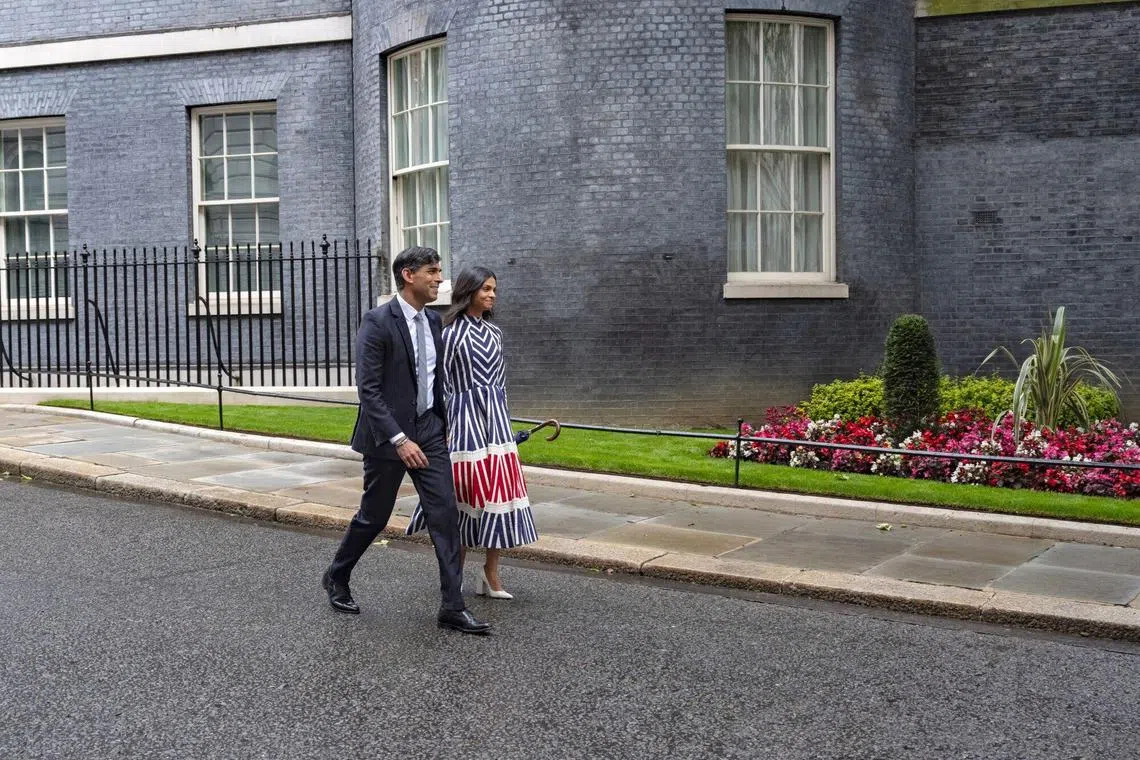 Mr Rishi Sunak, the outgoing UK prime minister, departing with his wife after his resignation speech o July 5, 2024. New British Prime Minister Keir Starmer promised a government of “stability and moderation” after leading his Labour Party to a landslide election victory that ended 14 years of Conservative rule that became characterized by turmoil and infighting. Photographer: Tom Skipp/Bloomberg