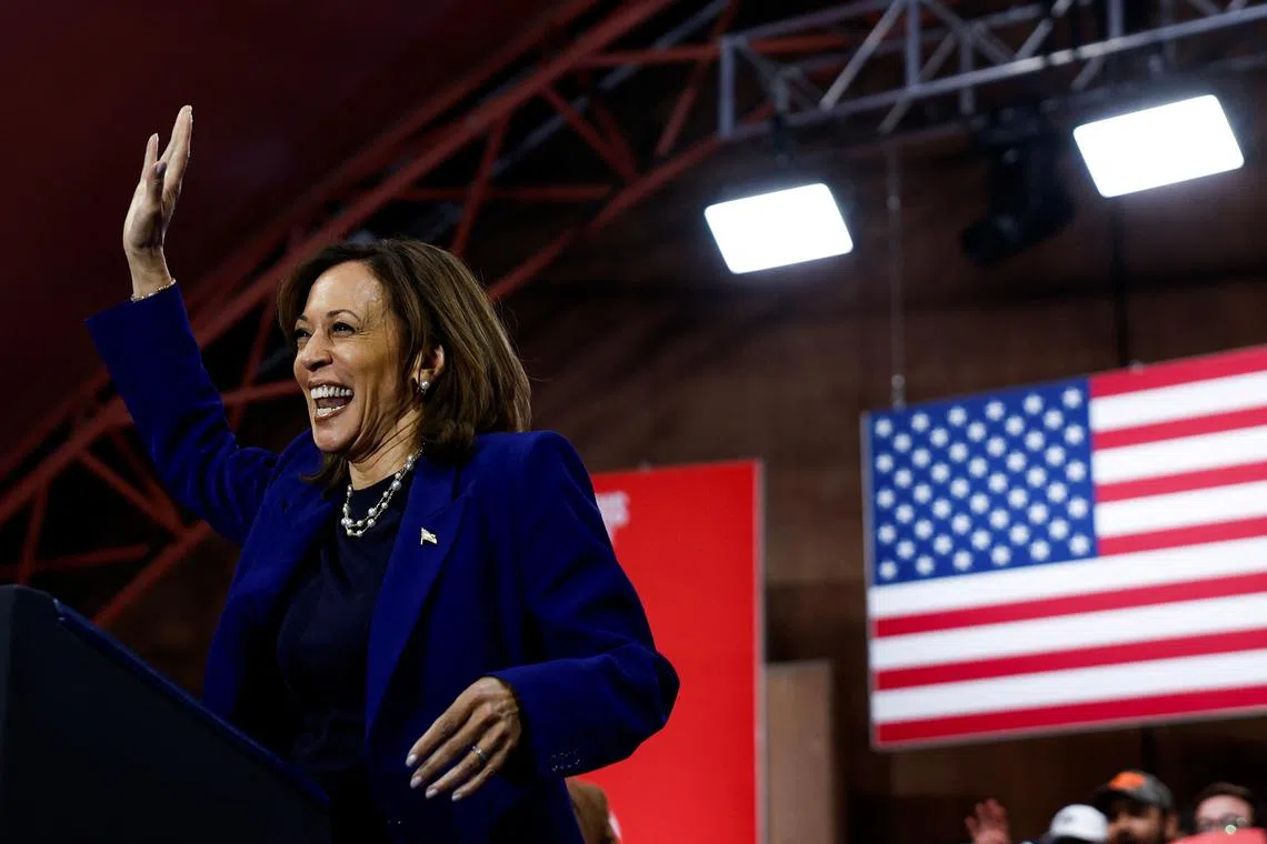 Democratic presidential nominee and US Vice-President Kamala Harris waves during a campaign rally, in North Las Vegas, Nevada, on Oct 31, 2024. 