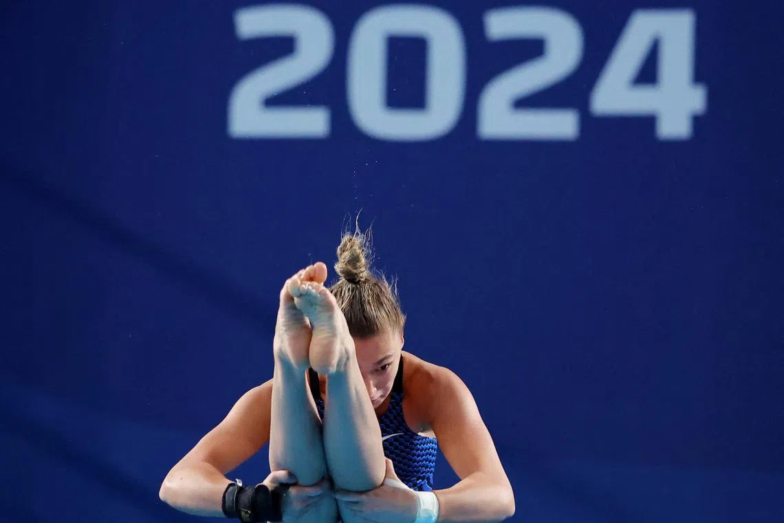 Diving - World Aquatics Championships - Hamad Aquatic Centre, Doha, Qatar - February 5, 2024 Puerto Rico's Maycey Adrianne Vieta in action during the women's 10m platform semi final REUTERS/Evgenia Novozhenina