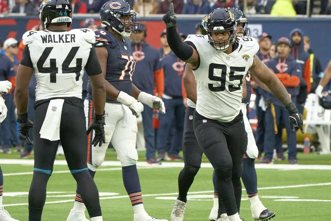 FILE PHOTO: Oct 13, 2024; London, United Kingdom; Jacksonville Jaguars defensive tackle Roy Robertson-Harris (95) reacts on the fields during the second half of an NFL International Series game at Tottenham Hotspur Stadium. Mandatory Credit: Peter van den Berg-Imagn Images/File Photo