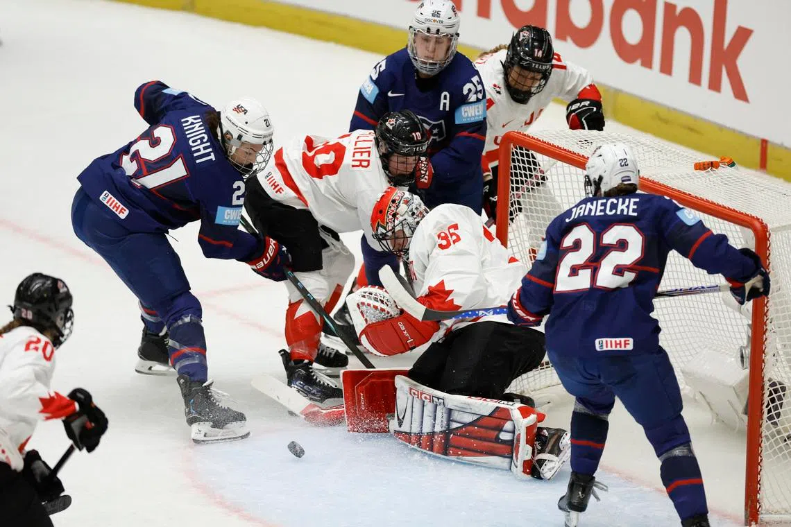 FILE PHOTO: Ice Hockey - IIHF Women's World Championships - Gold Medal Game - United States v Canada - Budvar Arena, Ceske Budejovice, Czech Republic - April 20, 2025 Hilary Knight of the U.S. in action with Canada's Ann-Renee Desbiens REUTERS/David W Cerny/File Photo