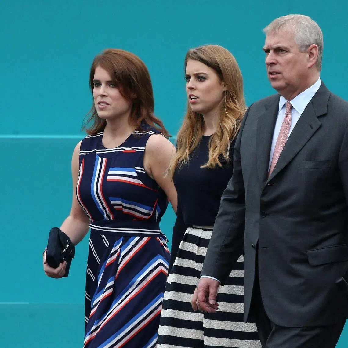 Britain's Princess Eugenie of York (left) and Princess Beatrice of York (right), daughters of Mr Andrew Mountbatten-Windsor, will not attend the traditional annual gathering for the family. 
