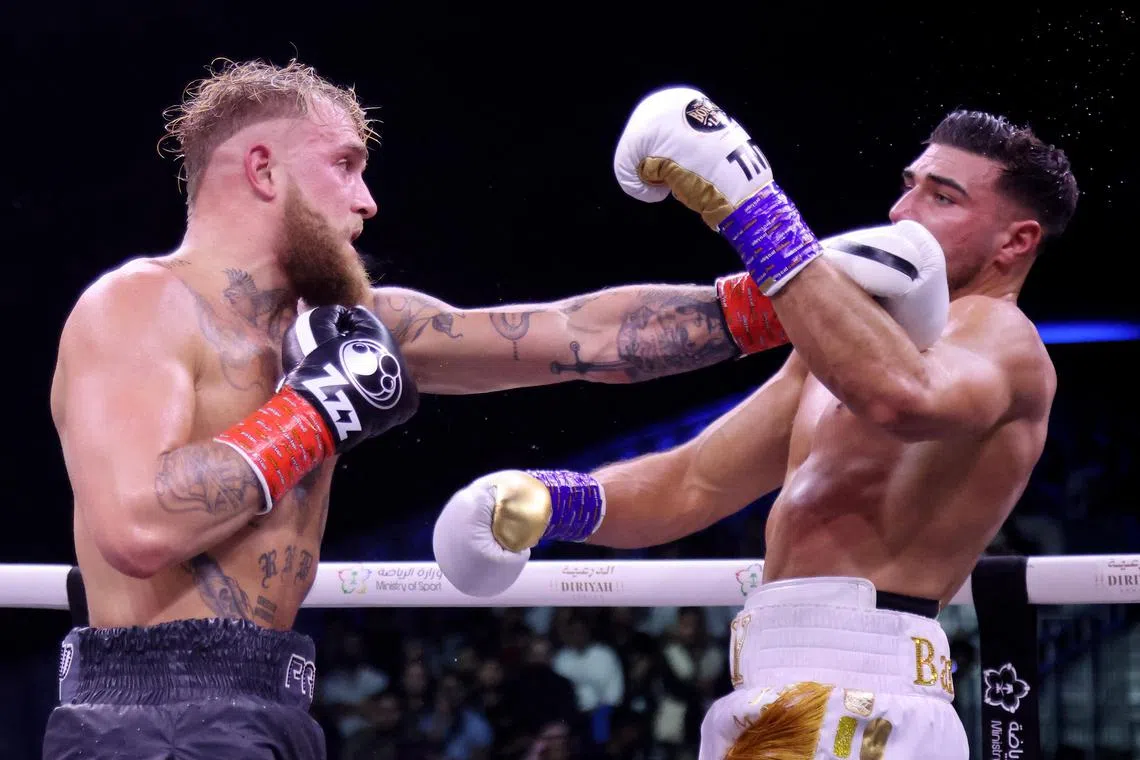 Social media star Jake Paul (left) in action against Love Island celebrity Tommy Fury in the Diriyah Arena in Riyadh, Saudi Arabia.