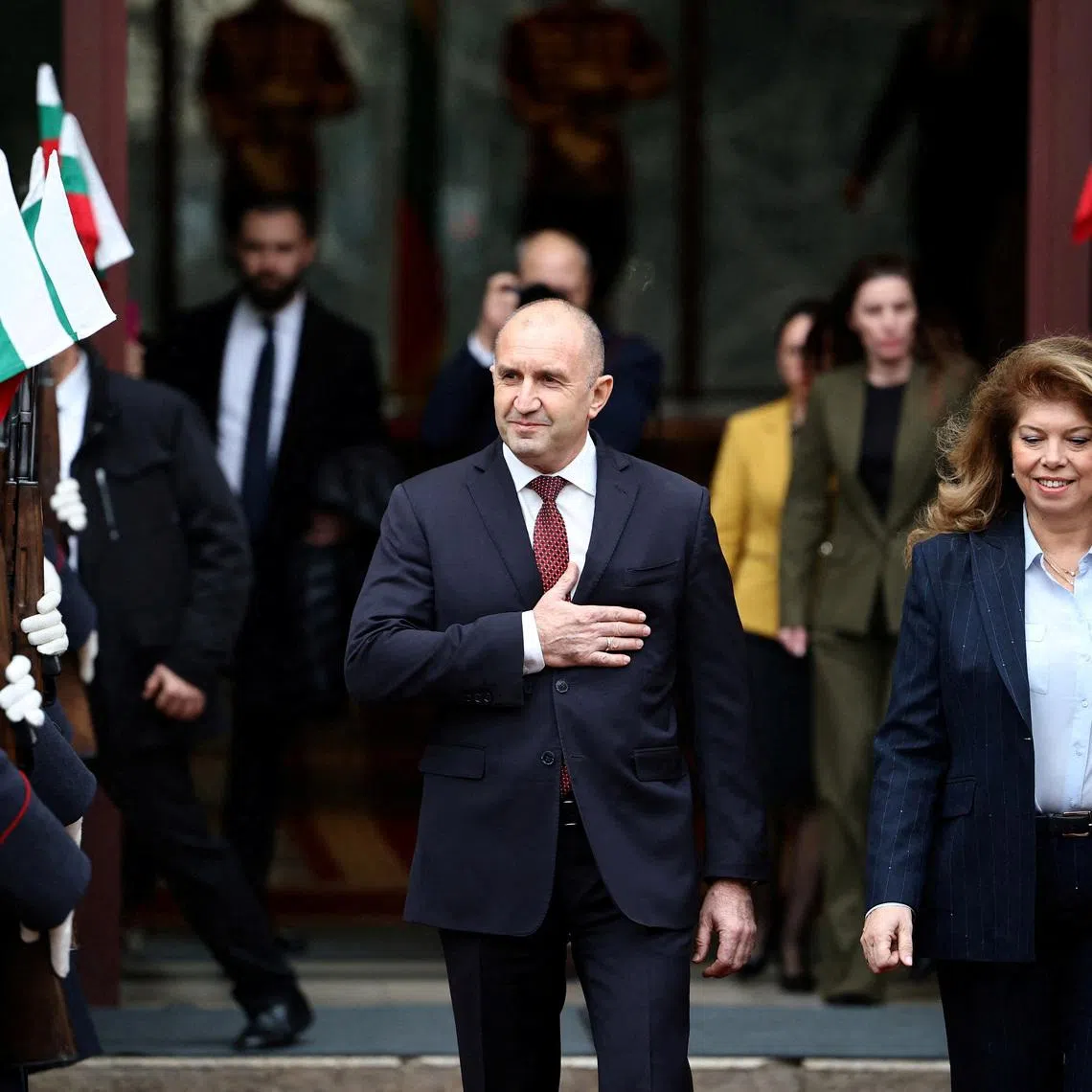 FILE PHOTO: Outgoing Bulgarian President Rumen Radev reacts next to President Iliana Iotova as he leaves the Presidency to officialy step down, in Sofia, Bulgaria, January 23, 2026. REUTERS/Stoyan Nenov/File Photo