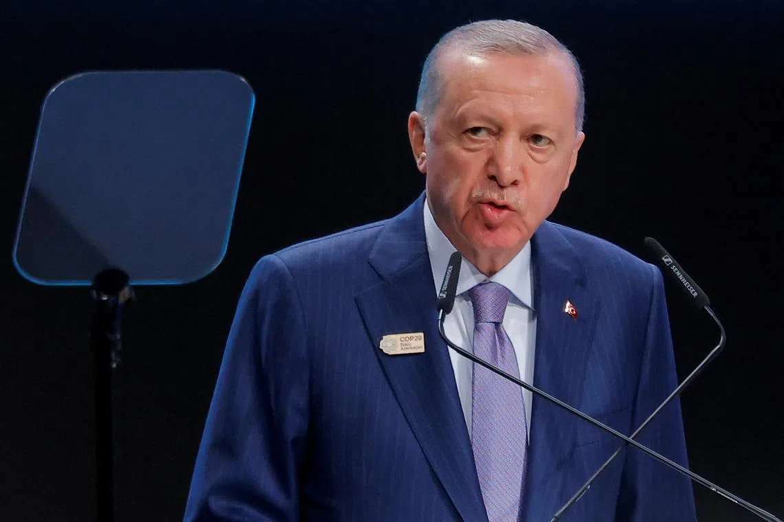 FILE PHOTO: Turkish President Tayyip Erdogan delivers a statement during the United Nations climate change conference COP29, in Baku, Azerbaijan November 12, 2024. REUTERS/Maxim Shemetov/File Photo