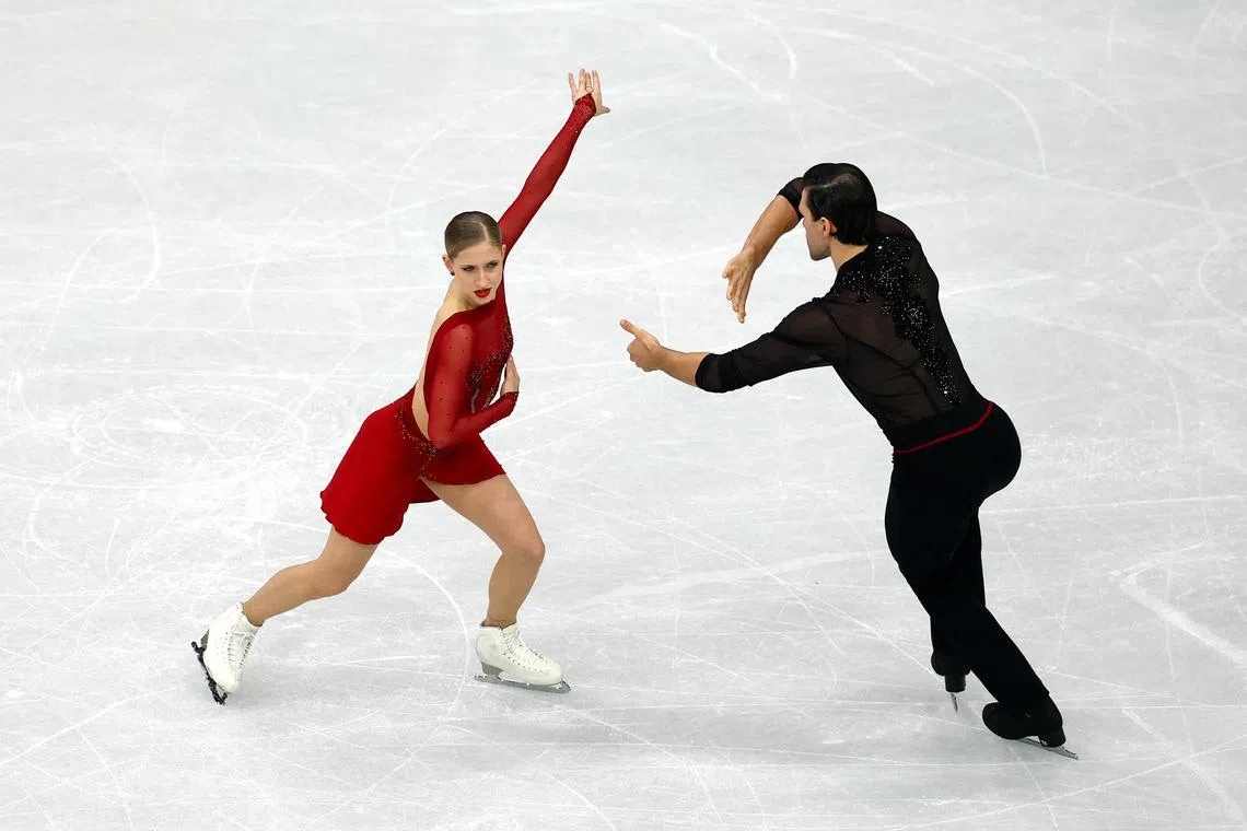 Milano Cortina 2026 Olympics - Figure Skating - Pair Skating - Short Program - Milano Ice Skating Arena, Milan, Italy - February 15, 2026. Minerva Fabienne Hase of Germany and Nikita Volodin of Germany perform during the Short Program. REUTERS/Yara Nardi