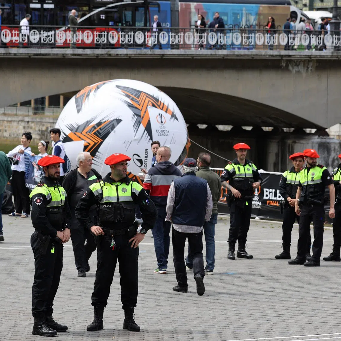 Soccer Football - Europa League - Final - Preview - Tottenham Hotspur v Manchester United - Bilbao, Spain - May 20, 2025 Police personnel stand guard in Bilbao ahead of the final REUTERS/Pankra Nieto
