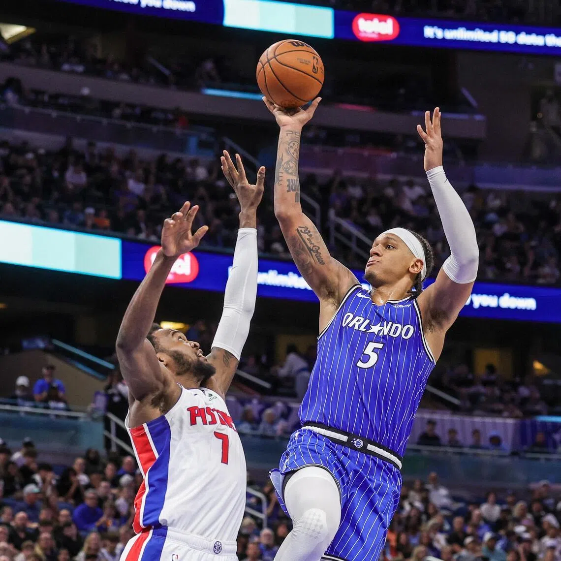 Paolo Banchero shooting against Detroit Pistons forward Paul Reed during the Orlando Magic's 123-107 NBA win at Kia Center on April 6, 2026.