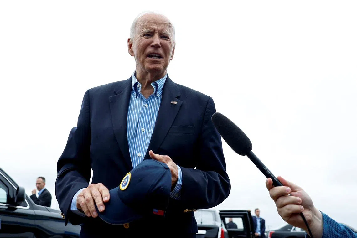 US President Joe Biden speaking to members of the media before boarding Air Force One, en route to North and South Carolina, in the wake of Hurricane Helene.