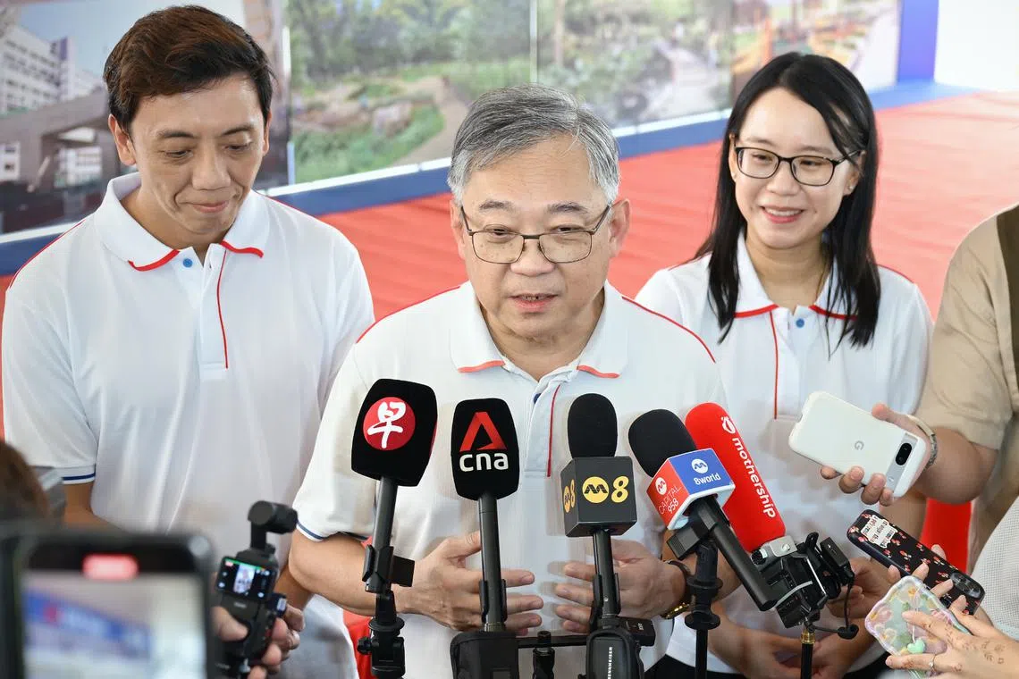 DPM Gan Kim Yong speaking to the media at the launch of the Chua Chu Kang Town Council’s five-year plan. With him are former top civil servant Jeffrey Siow and fellow PAP new face, Dr Choo Pei Ling.