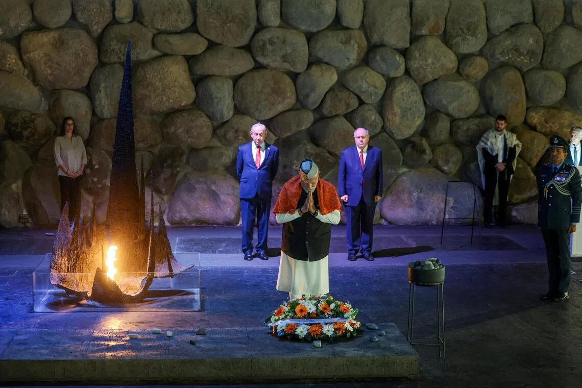 India’s PM Narendra Modi (centre) with Israeli PM Benjamin Netanyahu (left) at the Yad Vashem holocaust remembrance centre in Jerusalem, on Feb 26.