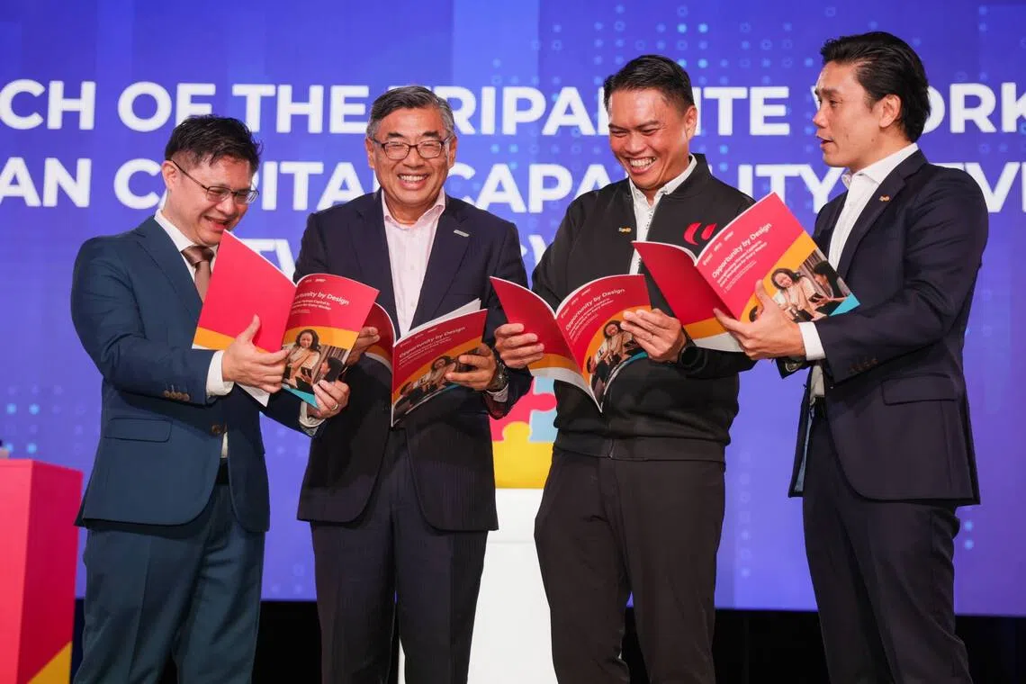 (From left) Minister of State for Manpower and Trade and Industry Foo Cexiang, 
Singapore National Employers Federation president Kuah Boon Wee, NTUC assistant secretary-general Patrick Tay and Kenny Tan, deputy secretary (workforce) at the Ministry of Manpower, at the launch of the Tripartite Workgroup on Human Capital Capability Development report.