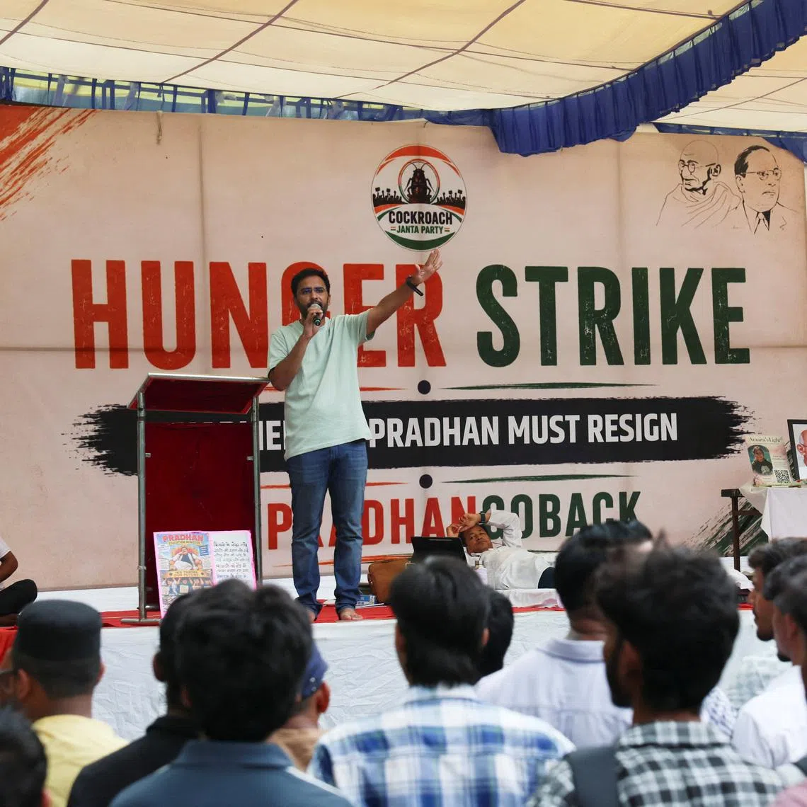 Supporters of the Cockroach Janta Party attending a sit-in protest called by CJP demanding the resignation of Indian Education Minister Dharmendra Pradhan on June 30.