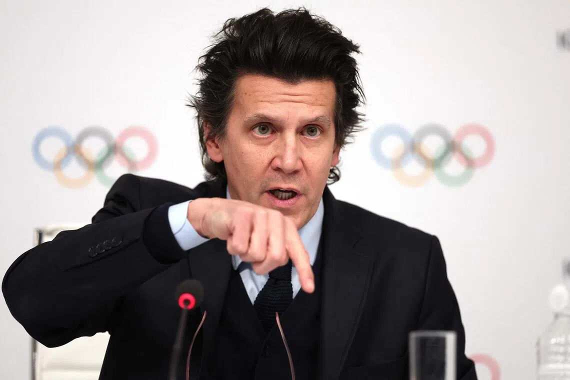 Olympic Games executive director Christophe Dubi gesturing during a press conference after an International Olympic Committee executive board committee meeting in Paris, on Nov 29, 2023.