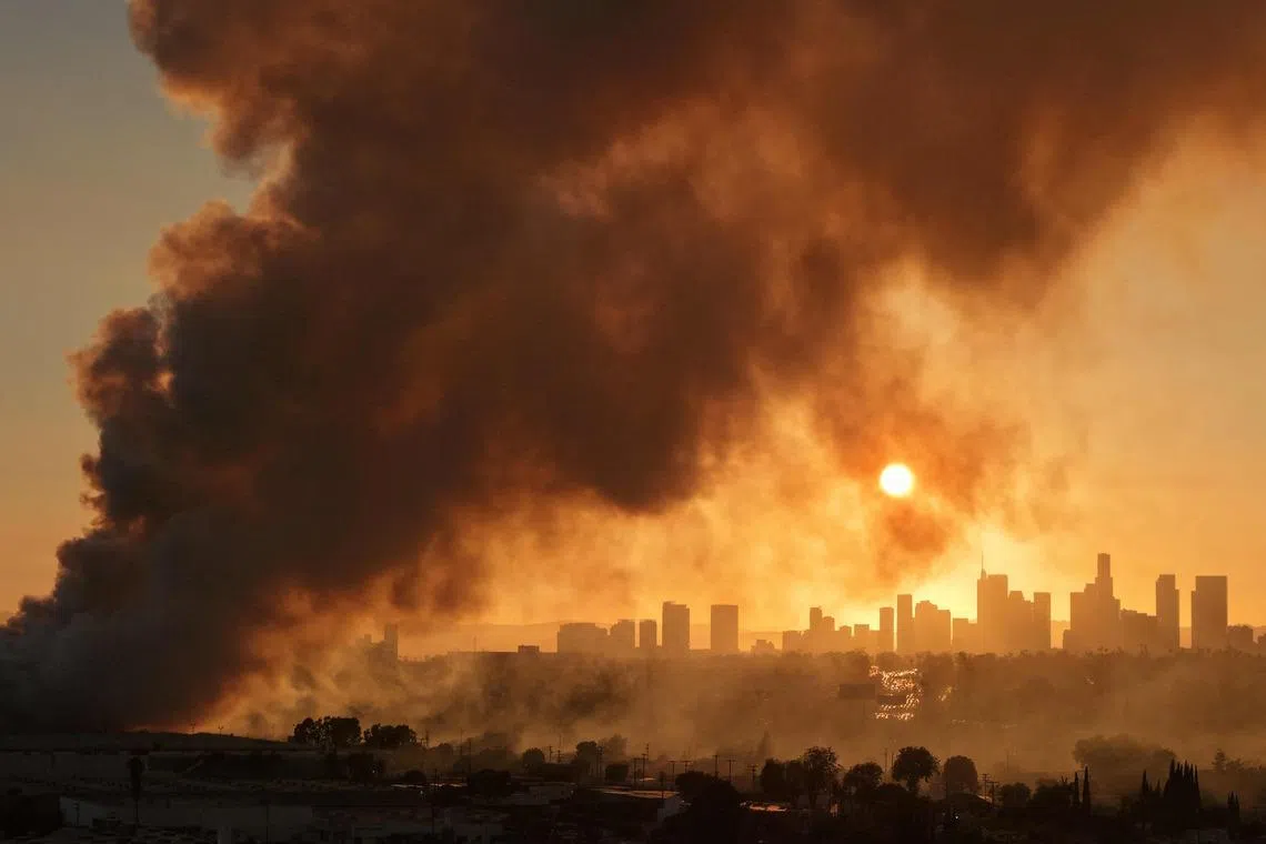 A massive warehouse fire at a cold storage facility continues to burn and spread smoke around Los Angeles on June 20.