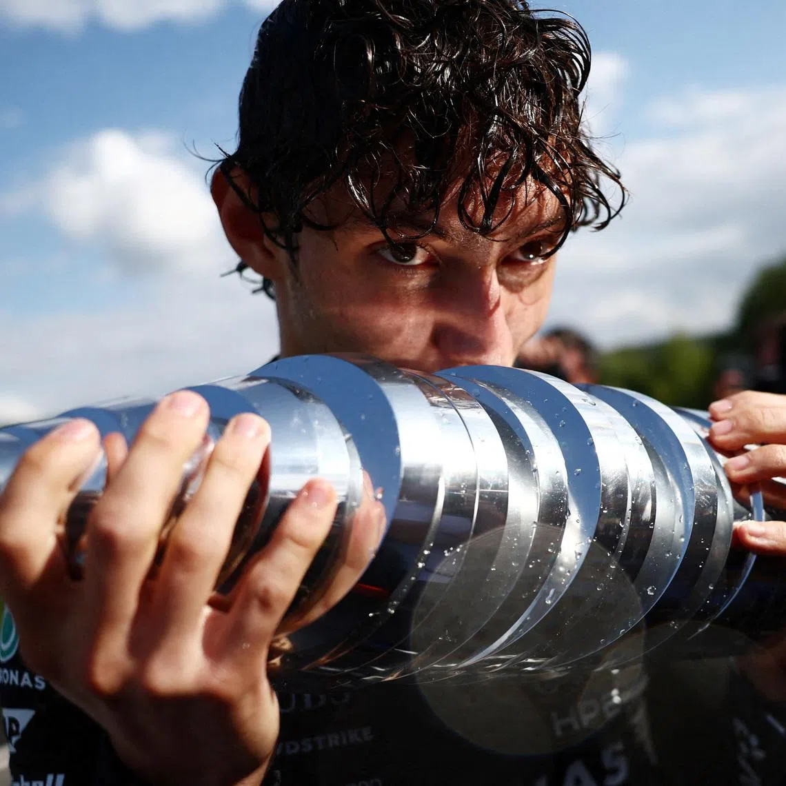 Formula One F1 - Belgian Grand Prix - Circuit de Spa-Francorchamps, Stavelot, Belgium - July 19, 2026 Mercedes' Andrea Kimi Antonelli kisses the trophy as he celebrates after winning the Belgian Grand Prix REUTERS/Jakub Porzycki