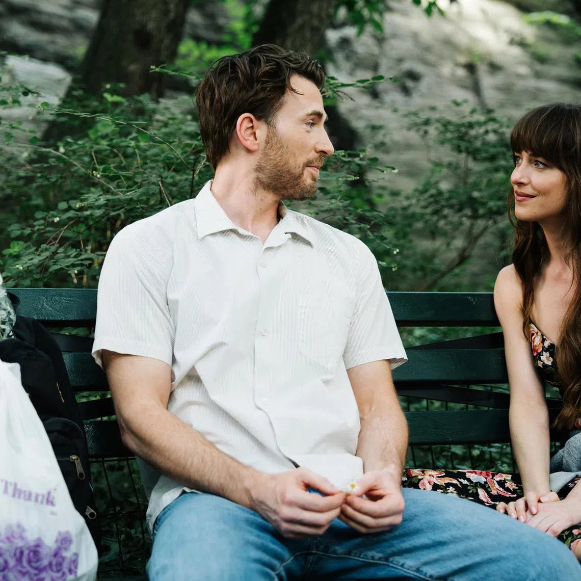 Chris Evans (left) and Dakota Johnson in Materialists.