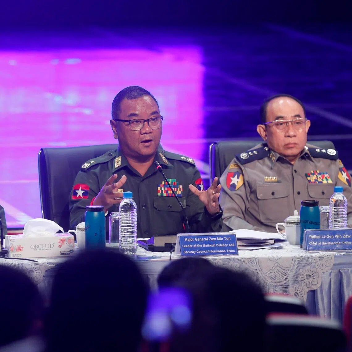 Myanmar's junta spokesman Zaw Min Tun (centre) speaking at a press conference in Yangon on Dec 14.