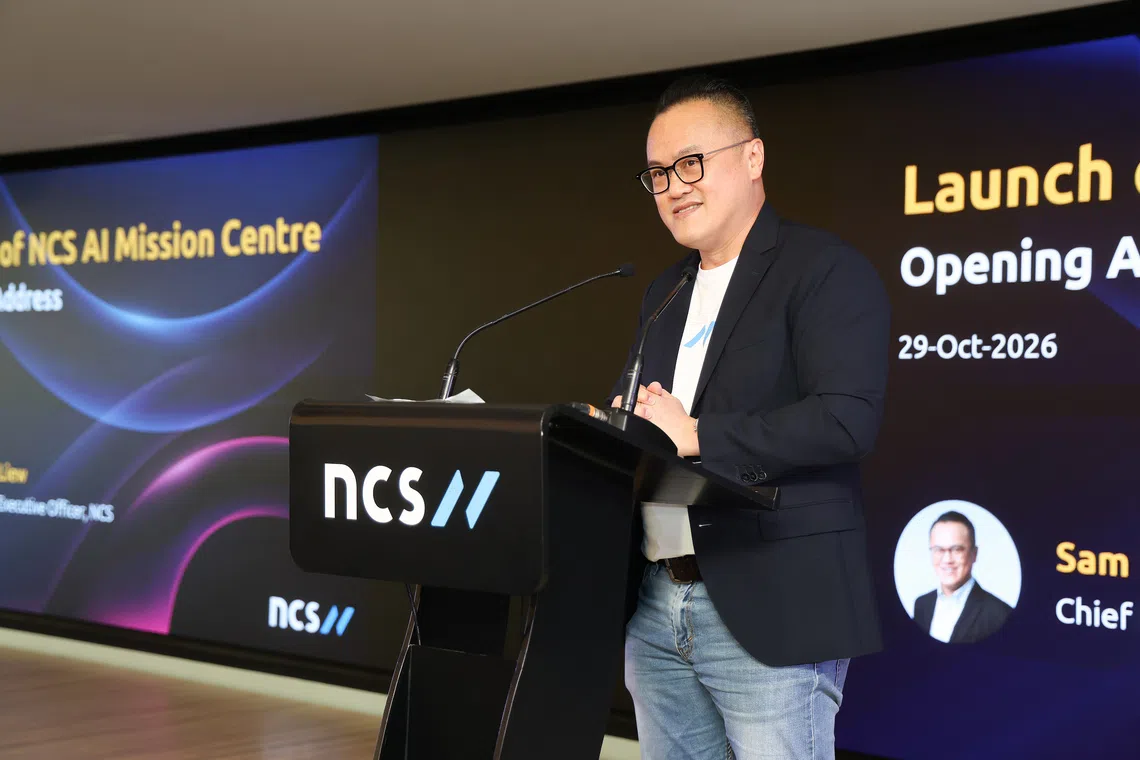NCS CEO Sam Liew speaking at the opening of NCS’ AI Mission Centre on Oct 29.