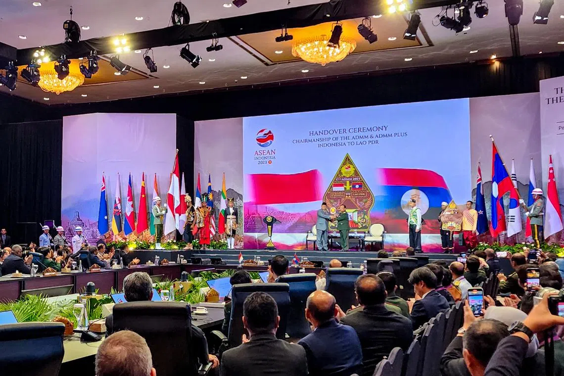 Indonesian Defence Minister Prabowo Subianto (left) handing over the chairmanship of the Asean Defence Ministers’ Meeting to Laos' Deputy Prime Minister and Minister of Defence Chansamone Chanyalath.