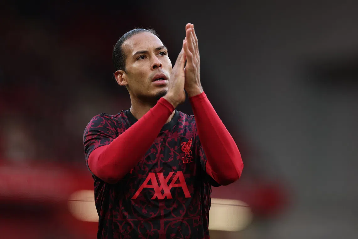 Soccer Football - Premier League - Liverpool v Brighton & Hove Albion - Anfield, Liverpool, Britain - December 13, 2025 Liverpool's Virgil van Dijk during the warm up before the match REUTERS/Phil Noble