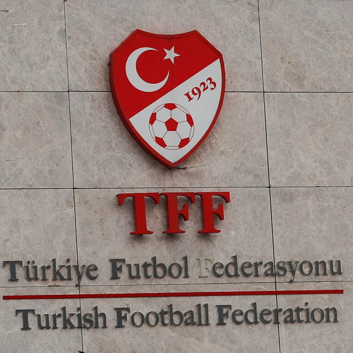 FILE PHOTO: A logo of the Turkish Football Federation (TFF) is seen at the entrance of Riva Hasan Dogan national team training centre and education facilities in Istanbul, Turkey December 12, 2023. REUTERS/Dilara Senkaya/File Photo