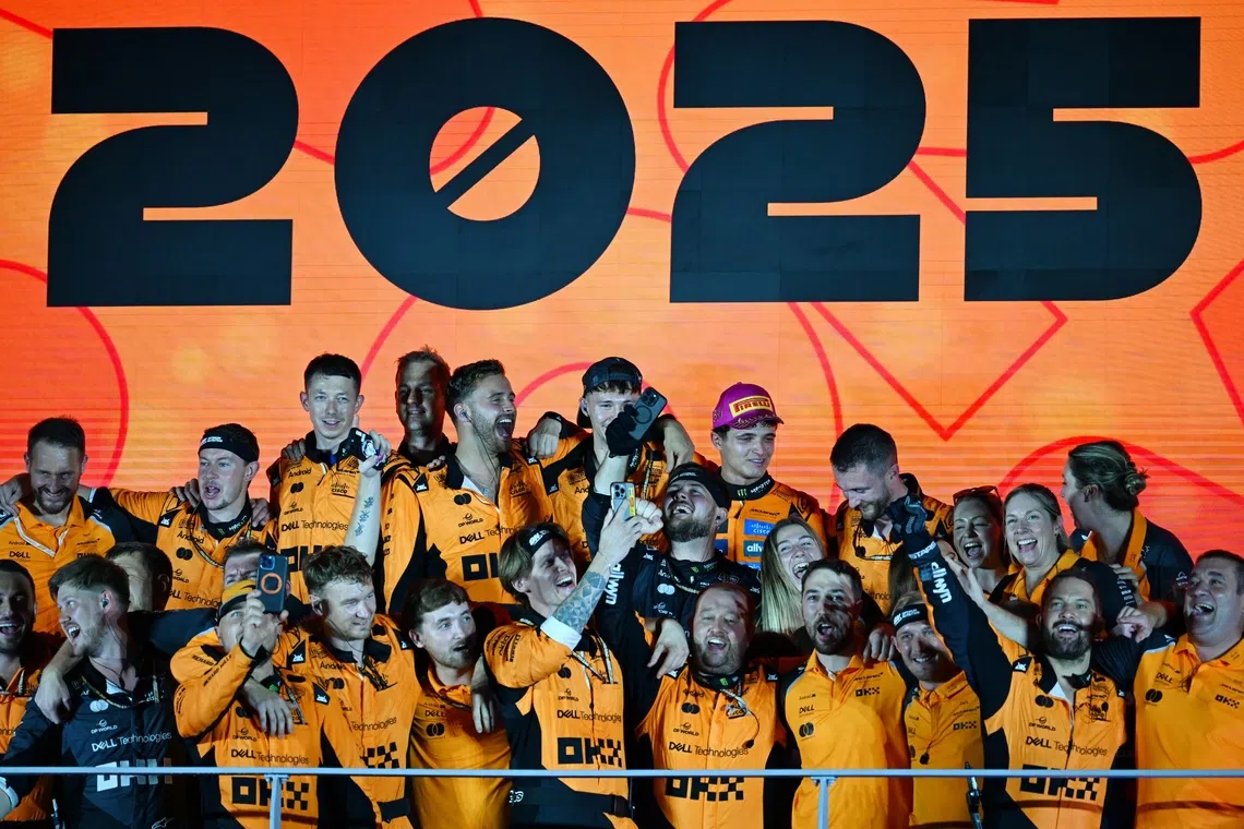McLaren's Formula 1 Team celebrating their Constructors Championship at the 2025 Formula One Singapore Airlines Singapore Grand Prix on Oct 5.
