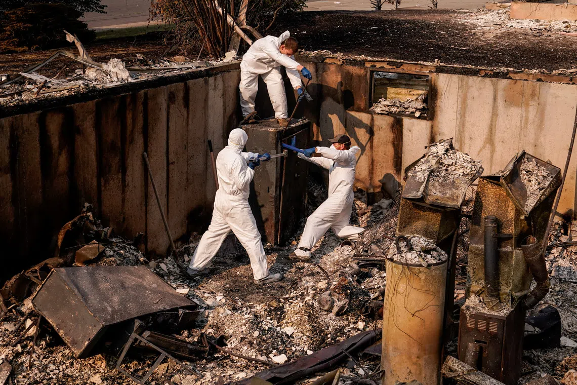 Over 64,000 people have been forced to evacuate the city, with residents doing what they can to salvage as much as possible.