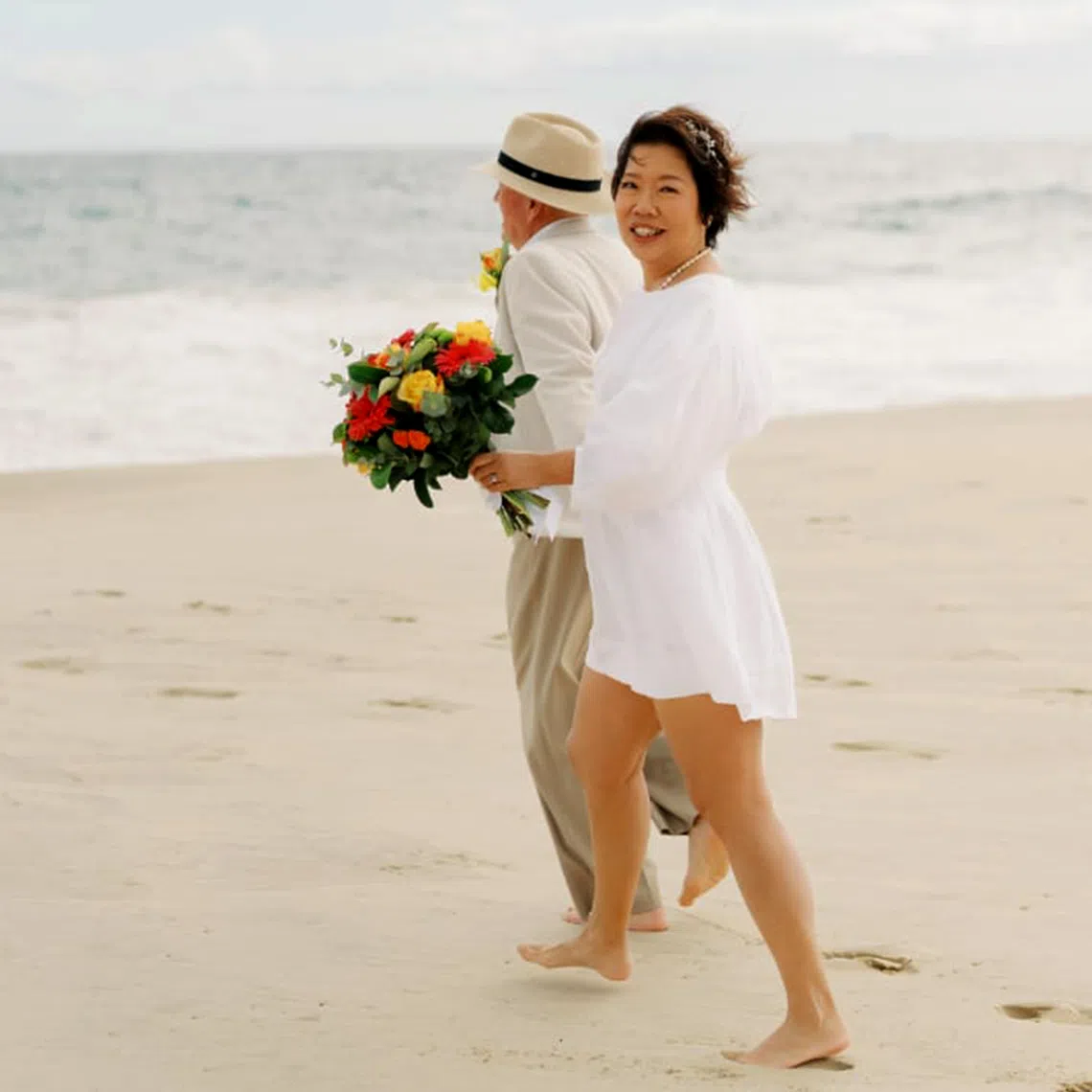 The writer and her partner had an Australian-style wedding with Irish and Singaporean Chinese accents, at a beach setting about 30 minutes north of Perth. Theirs was not just a union of two people but also a blending of cultures and new ways of seeing the world, she says.