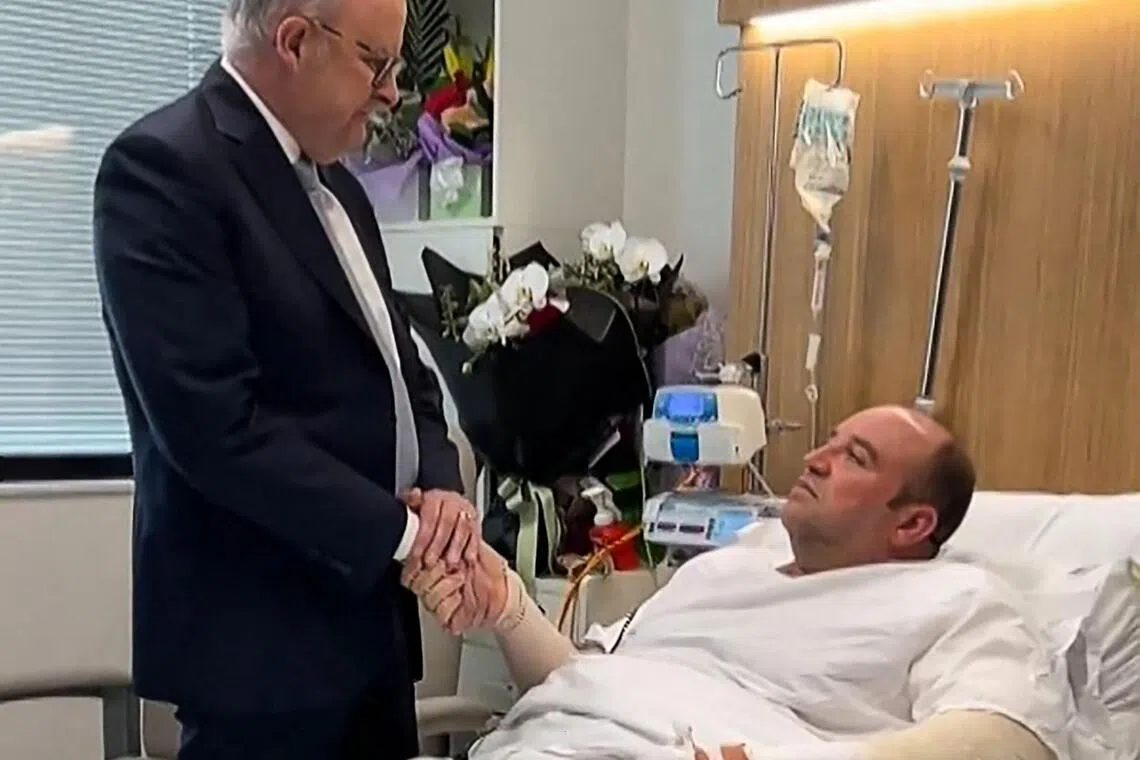 Australia's Prime Minister Anthony Albanese meeting Ahmed al Ahmed in hospital in Sydney. 