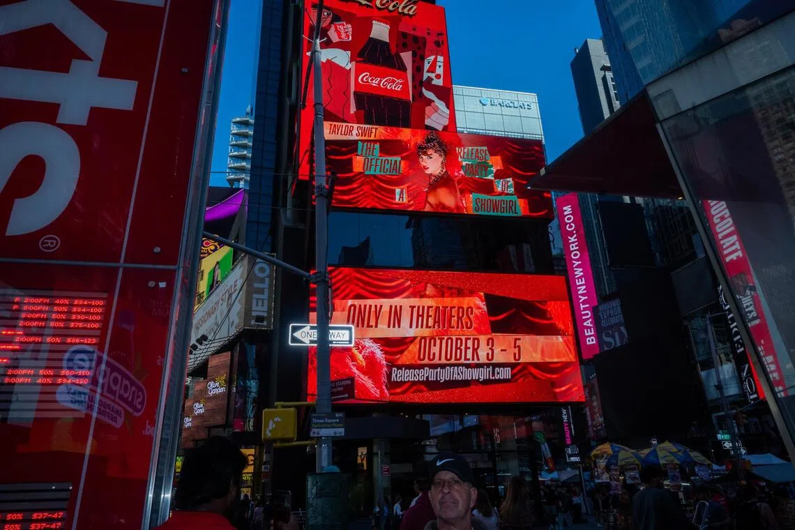 epa12431522 A billboard advertises Taylor Swift's album 'The Life of a Showgirl' at Times Square in New York, New York, USA, 04 October 2025. Swift, one of the biggest pop stars in the world released her 12th studio on 03 October.  EPA/JOHN TAGGART