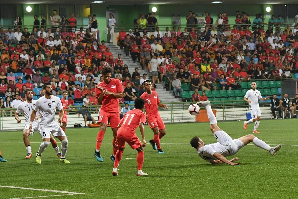 Palestine’s Mahmoud Wadi’s attempt is stifled by Singapore’s resolute defending. The World Cup Qualifier Asian Zone, Group D football match between Singapore and Palestine was held at the Jalan Besar Stadium on 10 Sep 2019.