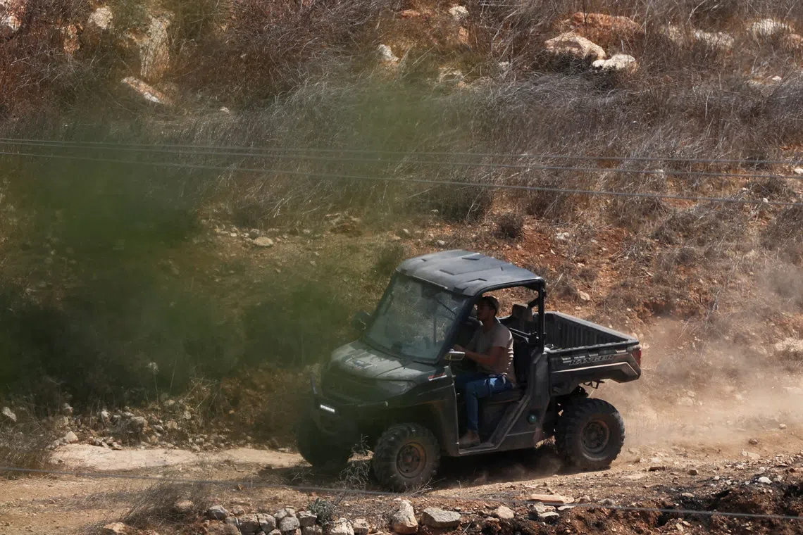 Israeli settlers attack West Bank village, blocking family's return home