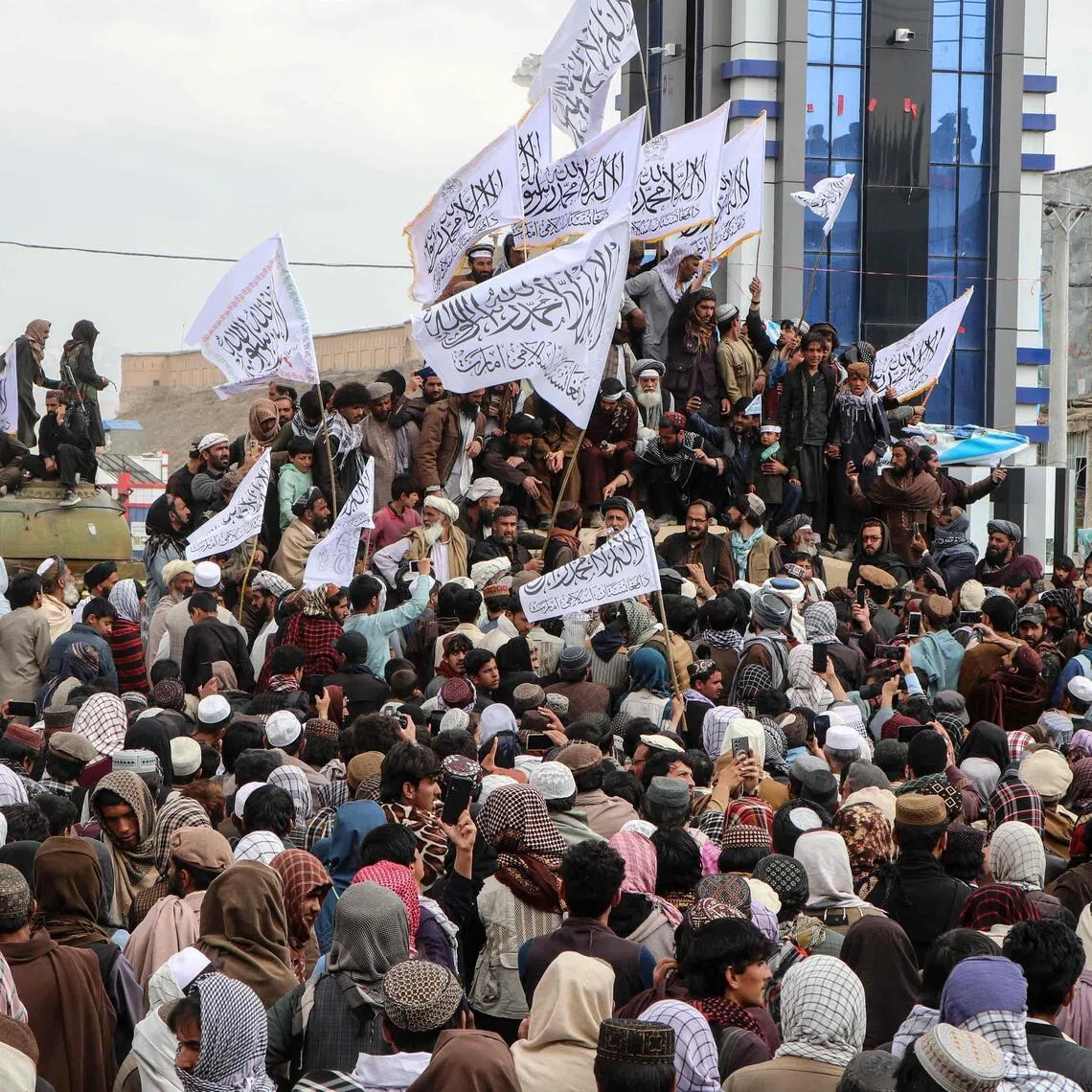 Afghan men gather to show their solidarity for the Taliban personnel in Gardez of Paktia province on March 4, amid ongoing cross-border conflict between Pakistan and Afghanistan.