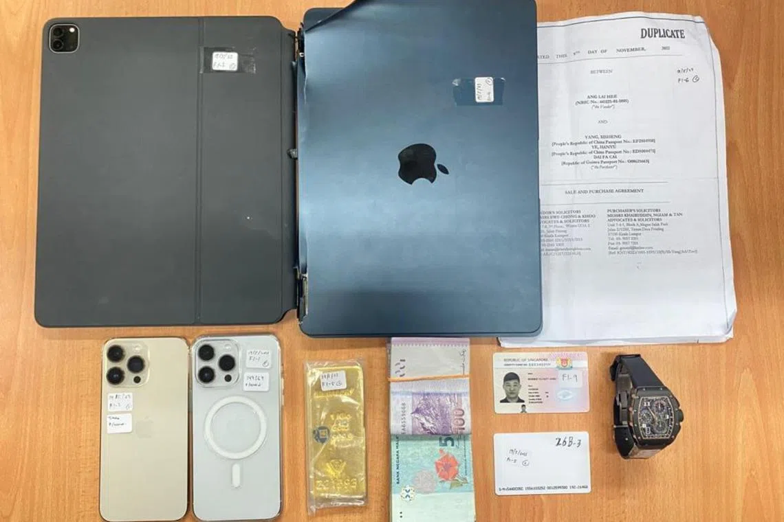 Seizures by the Malaysia police included 88 handphones, three cars and multiple computers.