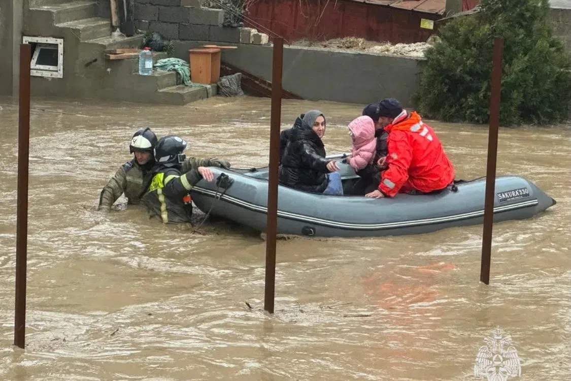 Emergency specialists evacuate residents from a flooded district in the city of Makhachkala in the Caucasus region of Dagestan, Russia, in this picture released March 28, 2026.  Emergency Ministry of Russia/Handout via REUTERS