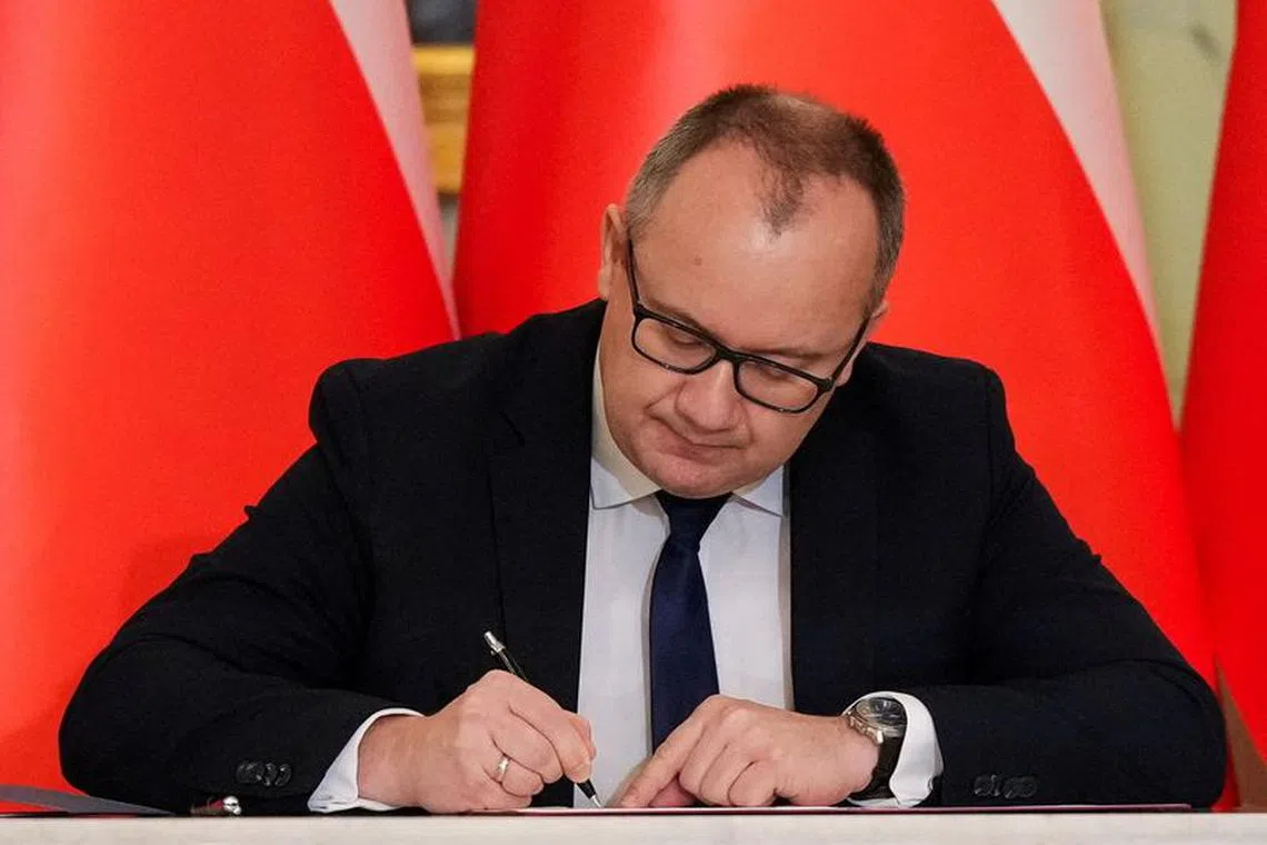 FILE PHOTO: Newly appointed Polish Justice Minister Adam Bodnar attends the cabinet swearing-in ceremony at the Presidential Palace in Warsaw, Poland December 13, 2023. REUTERS/Aleksandra Szmigiel/File Photo