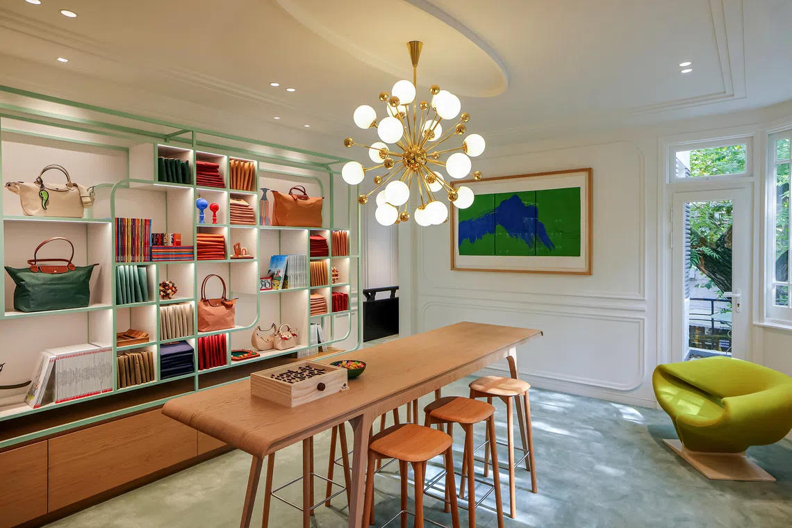 Past the elegant monochromatic facade, the 150 sq m home is designed like a French apartment.