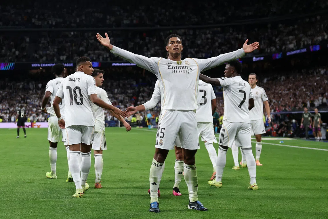 Soccer Football - UEFA Champions League - Real Madrid v Juventus - Santiago Bernabeu, Madrid, Spain - October 22, 2025 Real Madrid's Jude Bellingham celebrates scoring their first goal REUTERS/Violeta Santos Moura