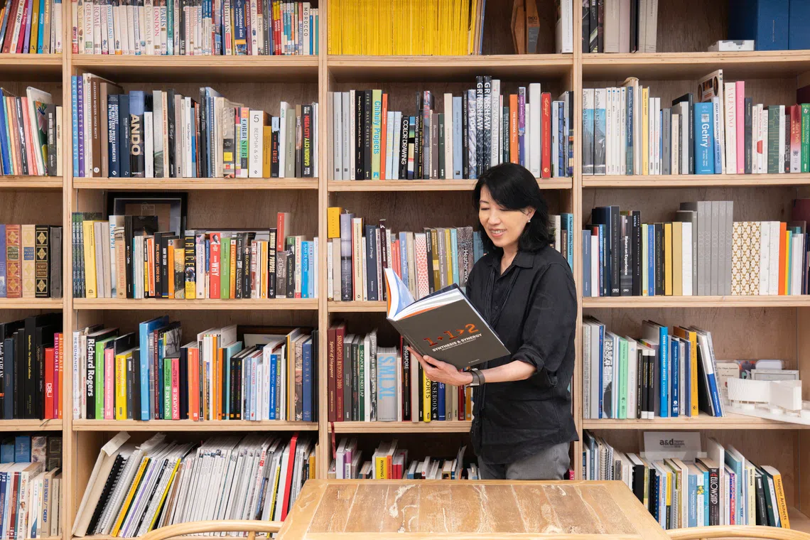 Angelene Chan always has a stack of five to seven books on her bedside table at any given time. 