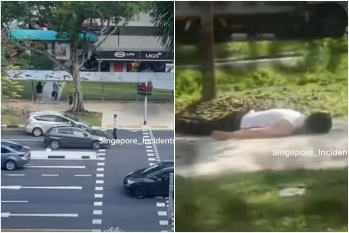 The man blocked cars from moving on the road while the pedestrian light was red.
