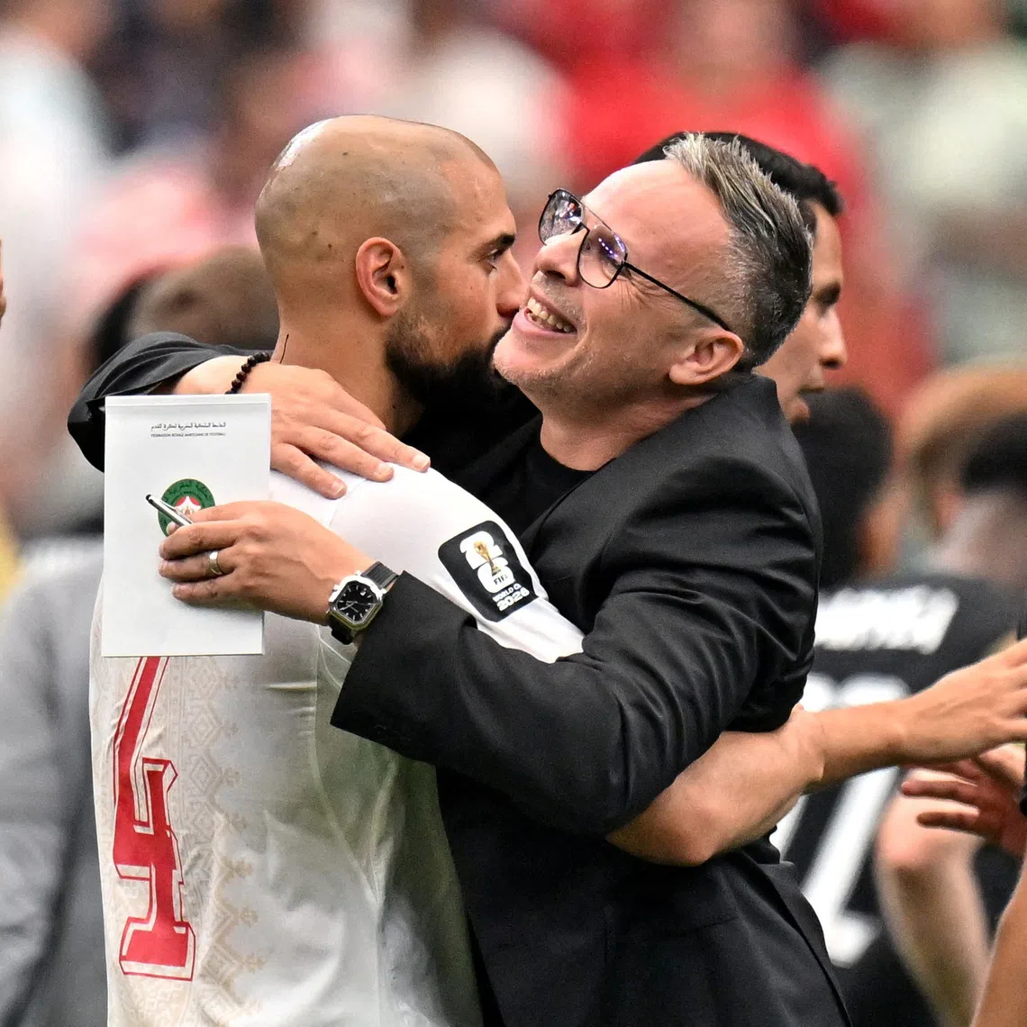 FILE PHOTO: Soccer Football - FIFA World Cup 2026 - Round of 16 - Canada v Morocco - Houston Stadium, Houston, Texas, U.S. - July 4, 2026 Morocco's Sofyan Amrabat and Morocco coach Mohamed Ouahbi celebrate after the match IMAGN IMAGES via Reuters/Maria Lysaker/File Photo